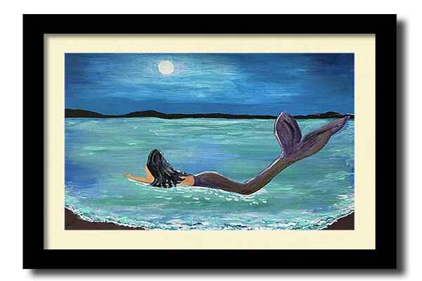 An acrylic painting framed print of a mermaid with long dark hair lies on the shore, gazing at the full moon in a tranquil night sky. 