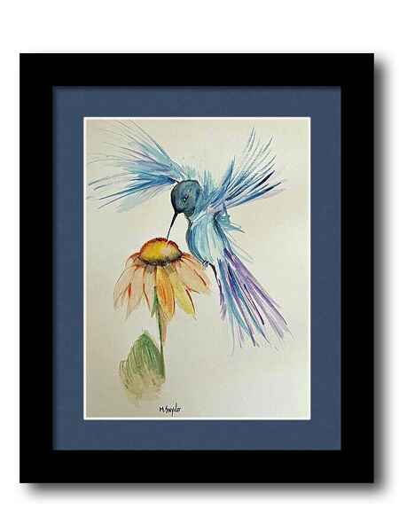 Hovering Hummingbird framed print