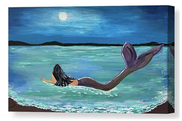 An acrylic painting canvas print of a mermaid with long dark hair lies on the shore, gazing at the full moon in a tranquil night sky. 